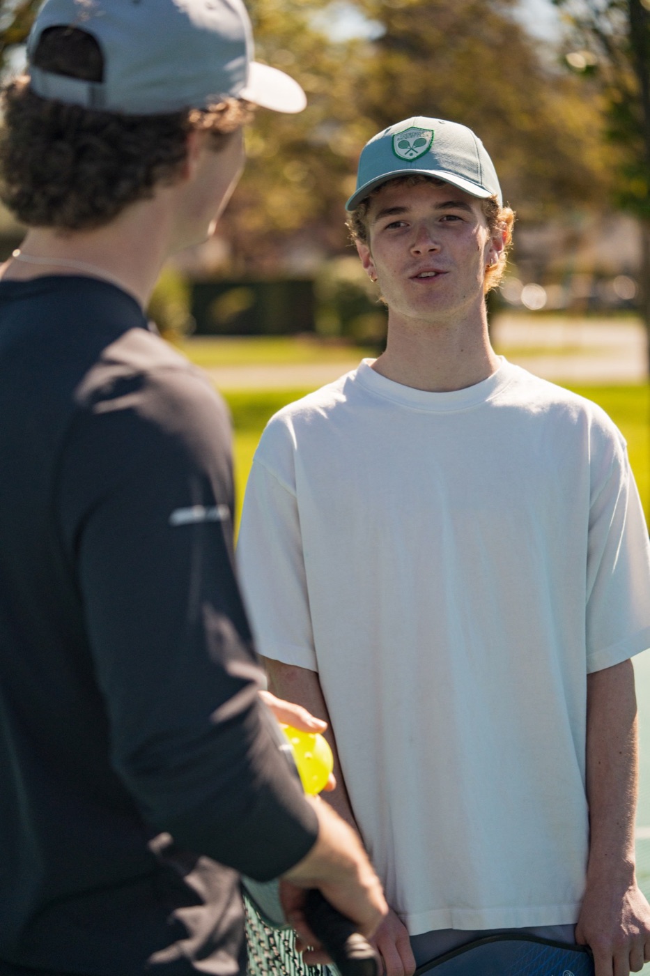Two players chatting between points